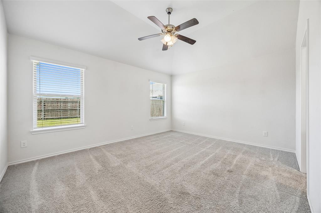 3807 Dogwood Road Melissa, TX 75454 - Photo 22 of 38 an empty room with a window and a fan