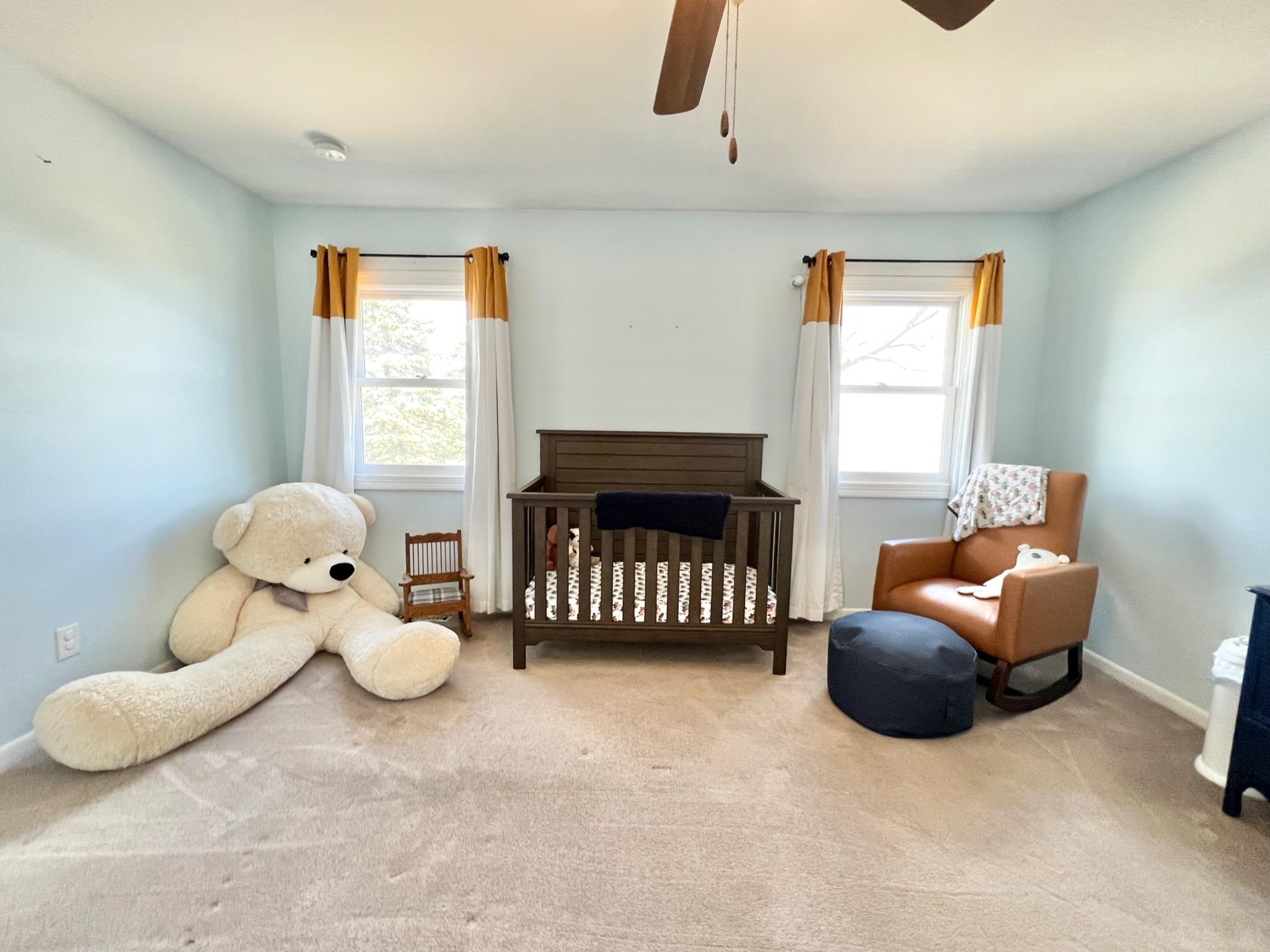 22860 Capron Road Capron, IL 61012 - Photo 25 of 39 a living room with furniture and a large window