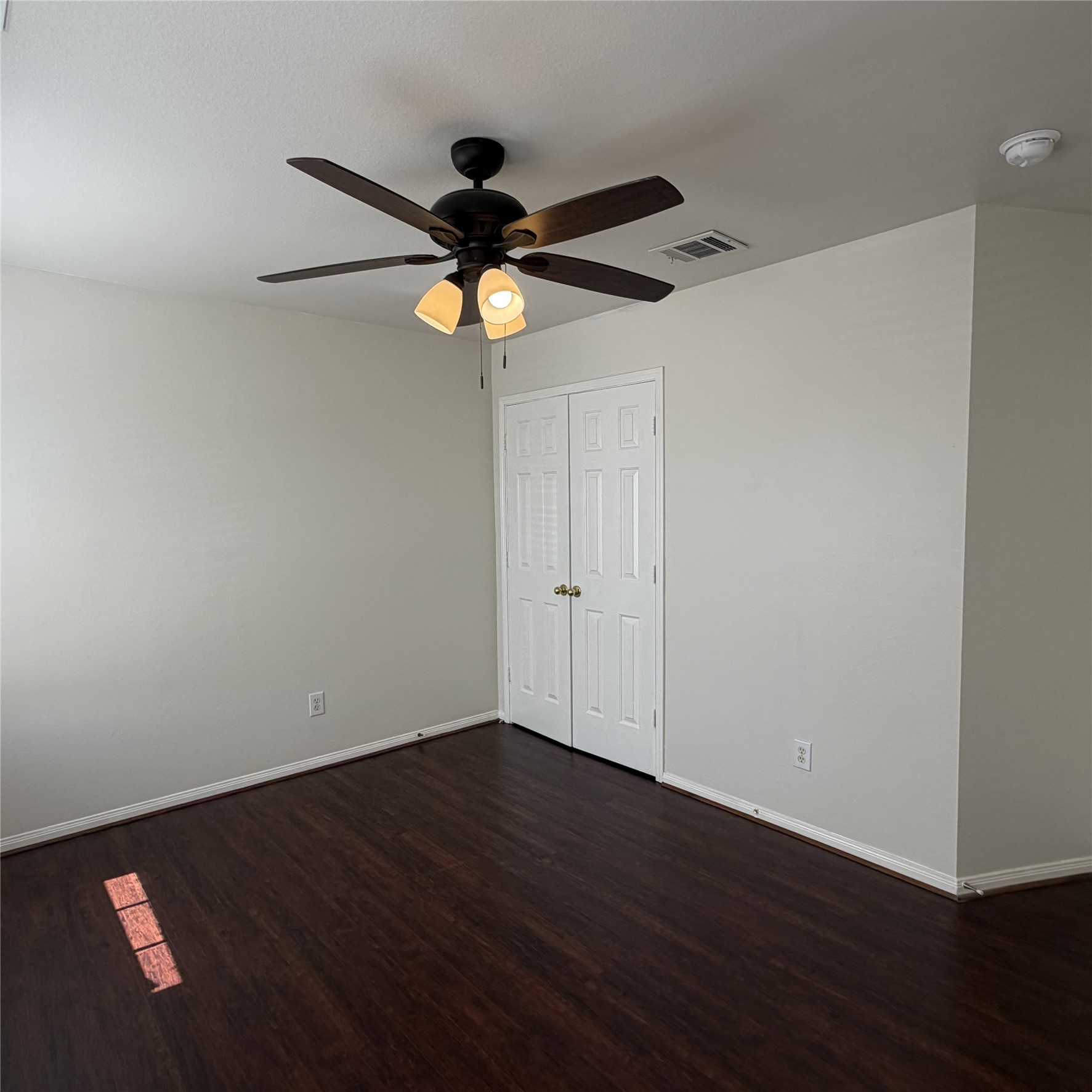 12219 Winderwick Lane Houston, TX 77066 - Photo 32 of 36 a view of an empty room with wooden floor