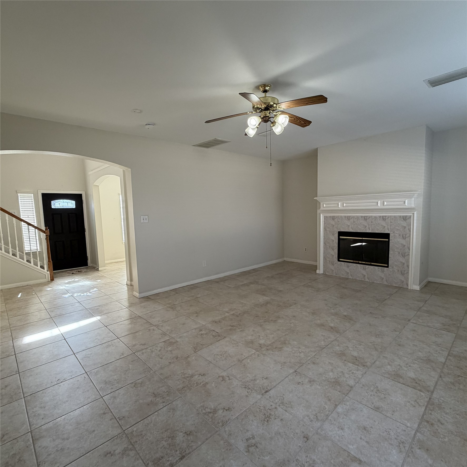 12219 Winderwick Lane Houston, TX 77066 - Photo 9 of 36 a view of empty room with a fireplace