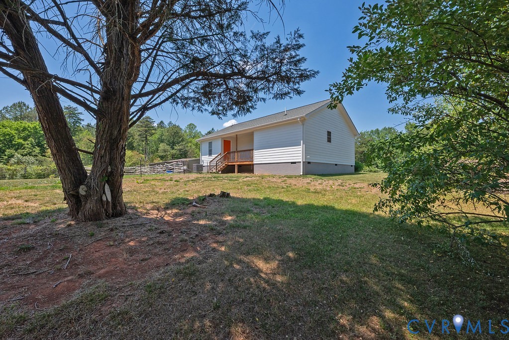 4336 Hells Bend Road Palmyra, VA 22963 - Photo 21 of 35 Property exterior featuring white siding, a contra
