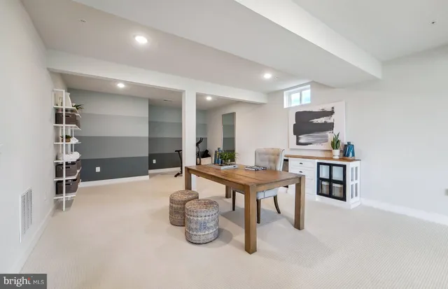 a living room with furniture a piano and a flat screen tv