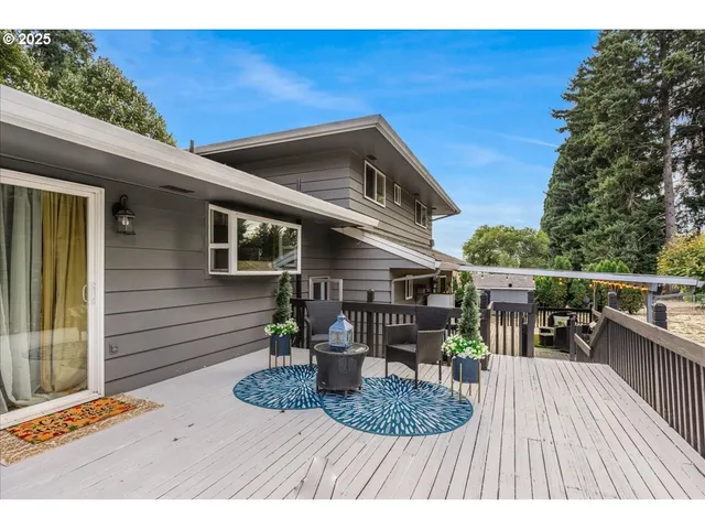 a view of sitting area in front of house
