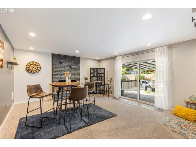 a view of a livingroom with furniture window and outside view