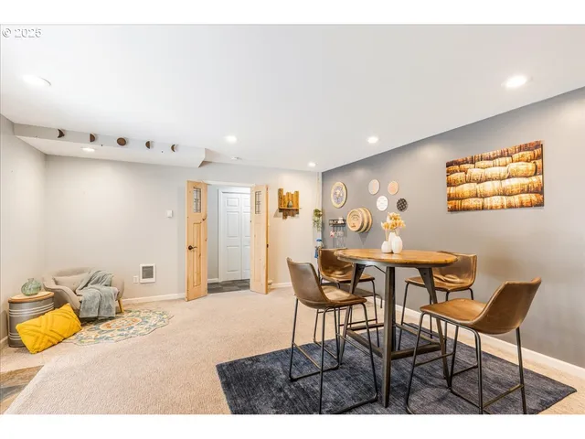 a view of a dining room with furniture