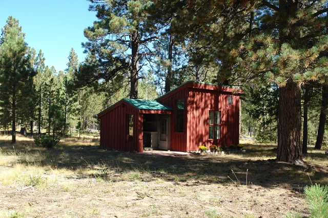 a view of a building with a yard
