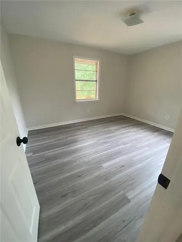 an empty room with windows