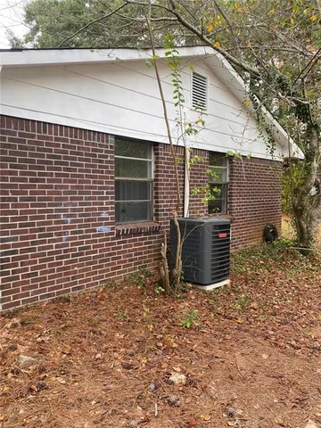 a view of backyard of a house