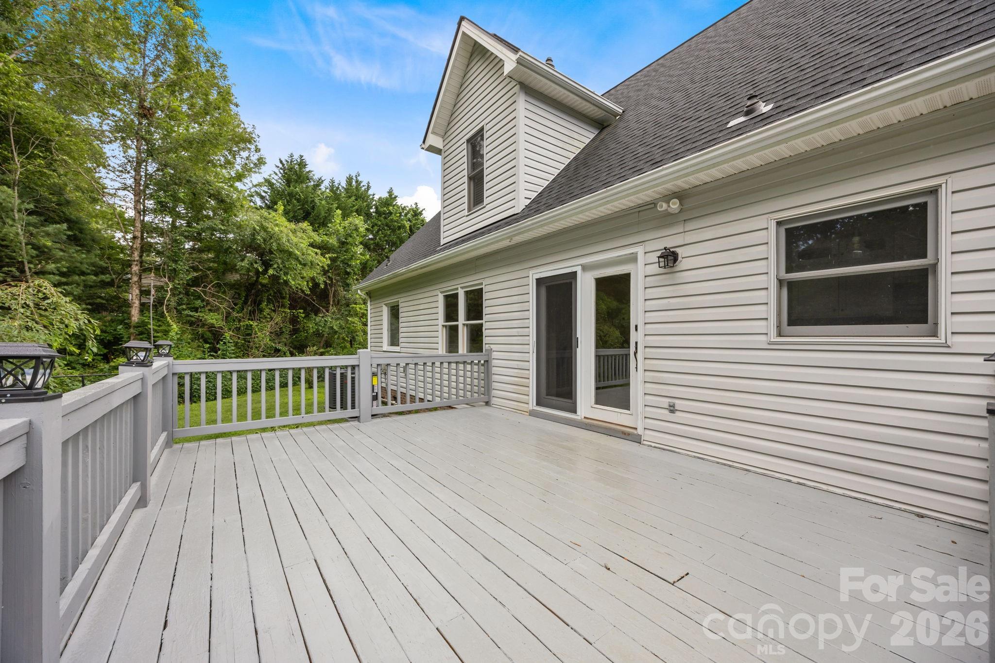 6 Springfield Way Arden, NC 28704 - Photo 12 of 47 a view of a house with a deck