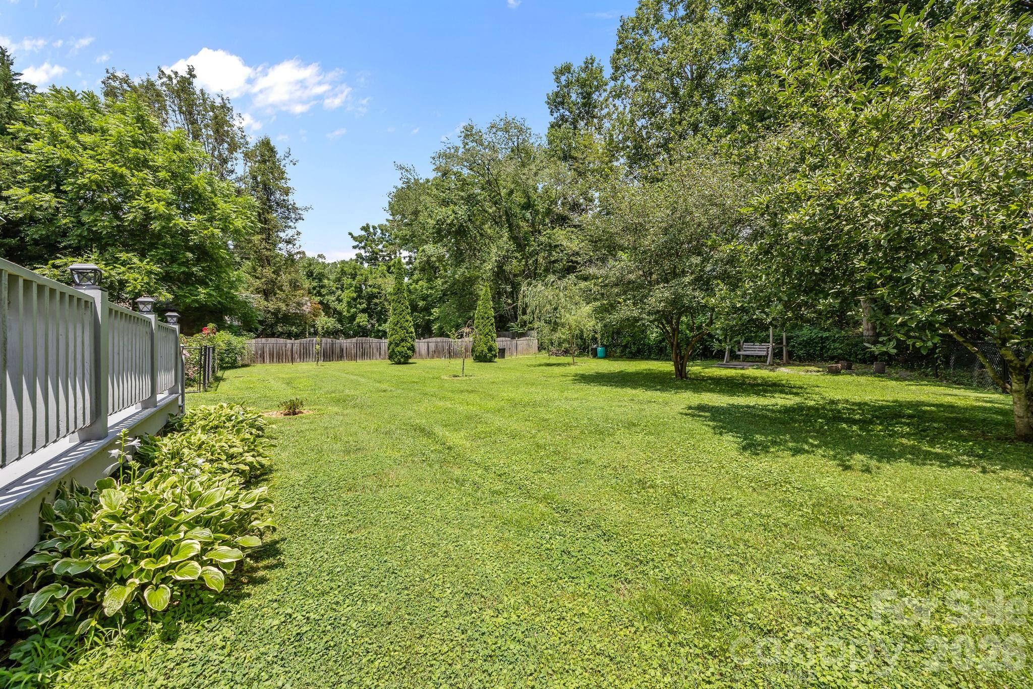 6 Springfield Way Arden, NC 28704 - Photo 13 of 47 a view of a park with large trees
