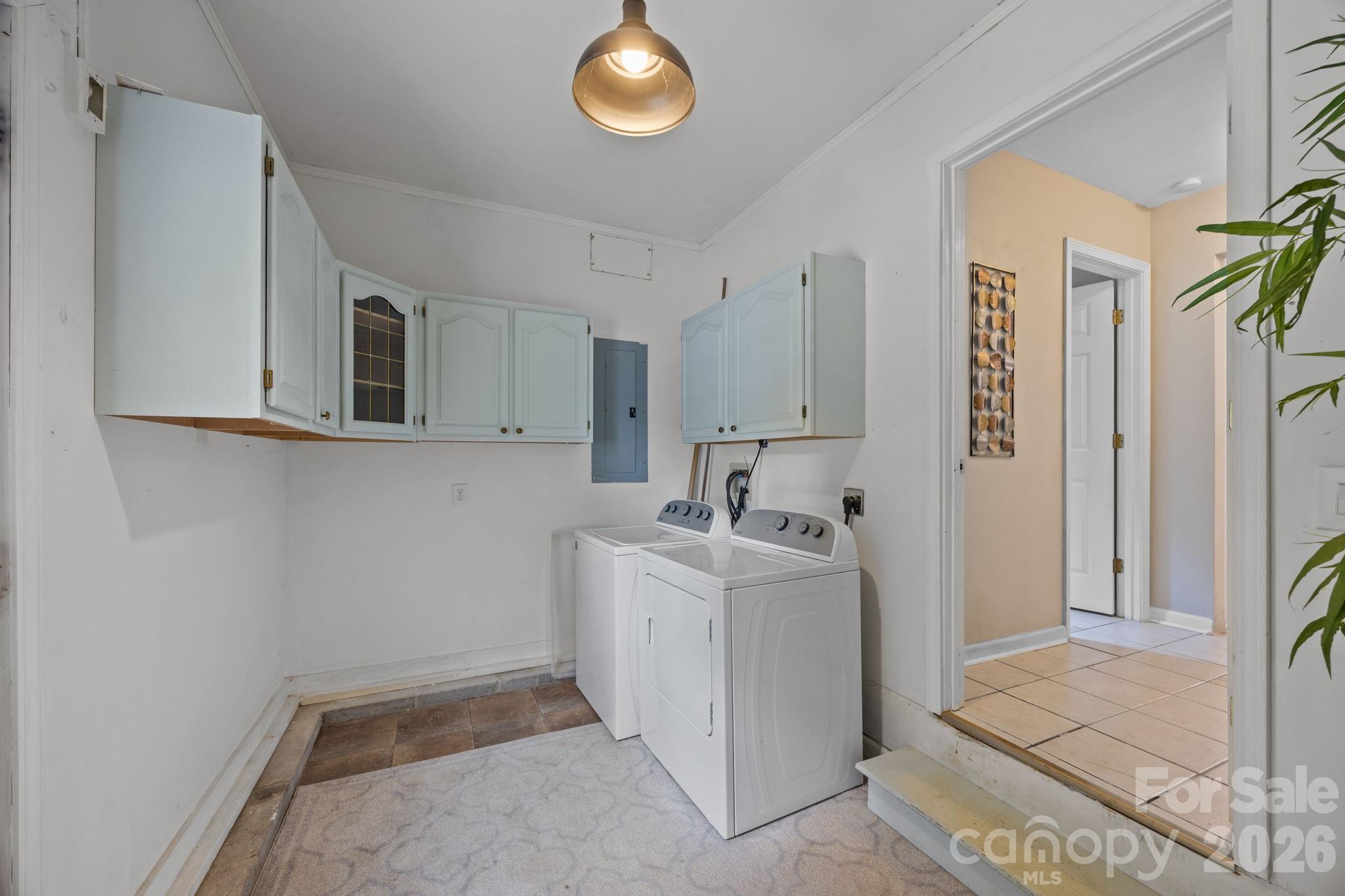 6 Springfield Way Arden, NC 28704 - Photo 31 of 47 a view of a storage & utility room with two washing machine