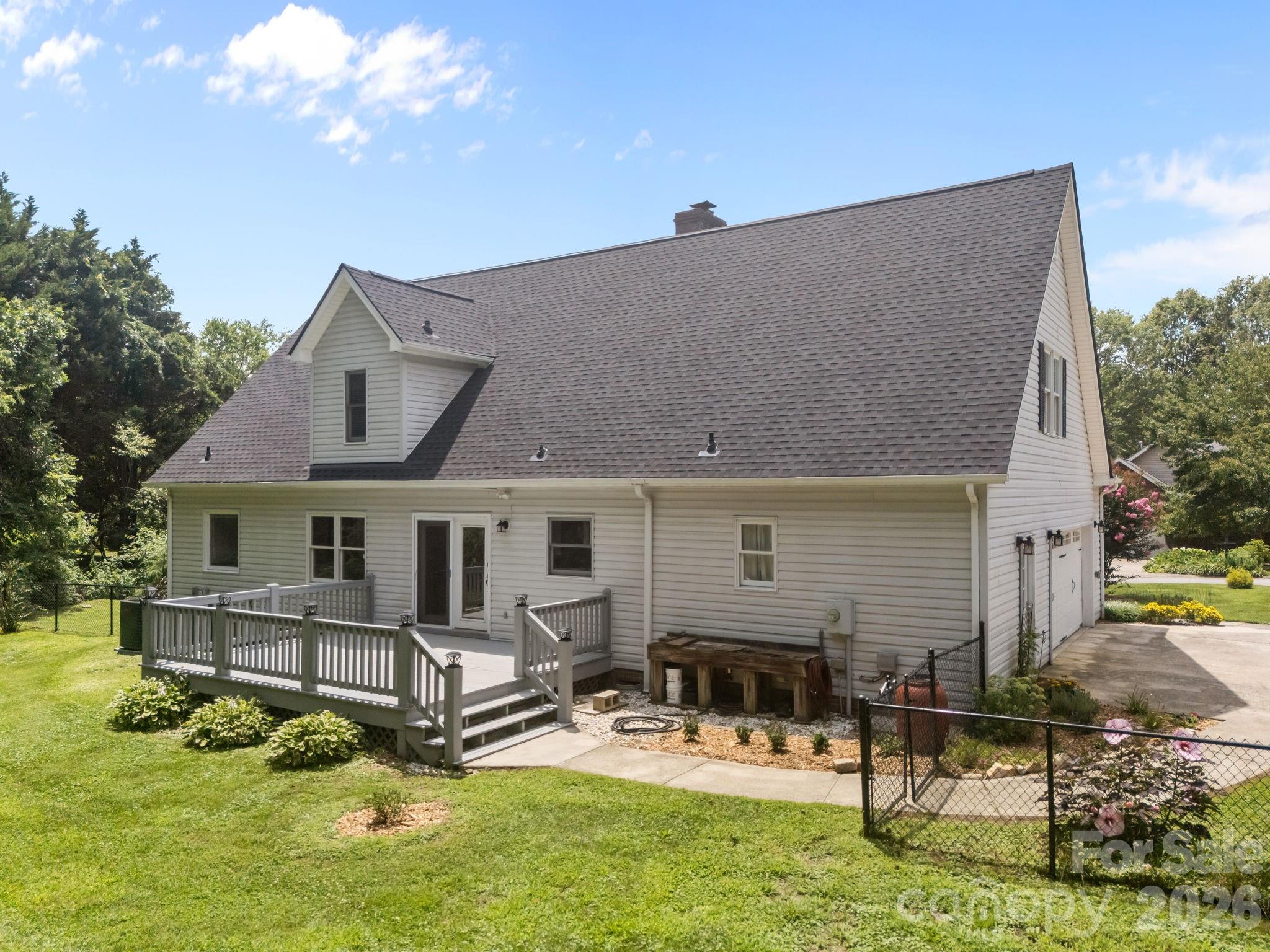 6 Springfield Way Arden, NC 28704 - Photo 34 of 47 a view of a house with backyard porch and sitting area