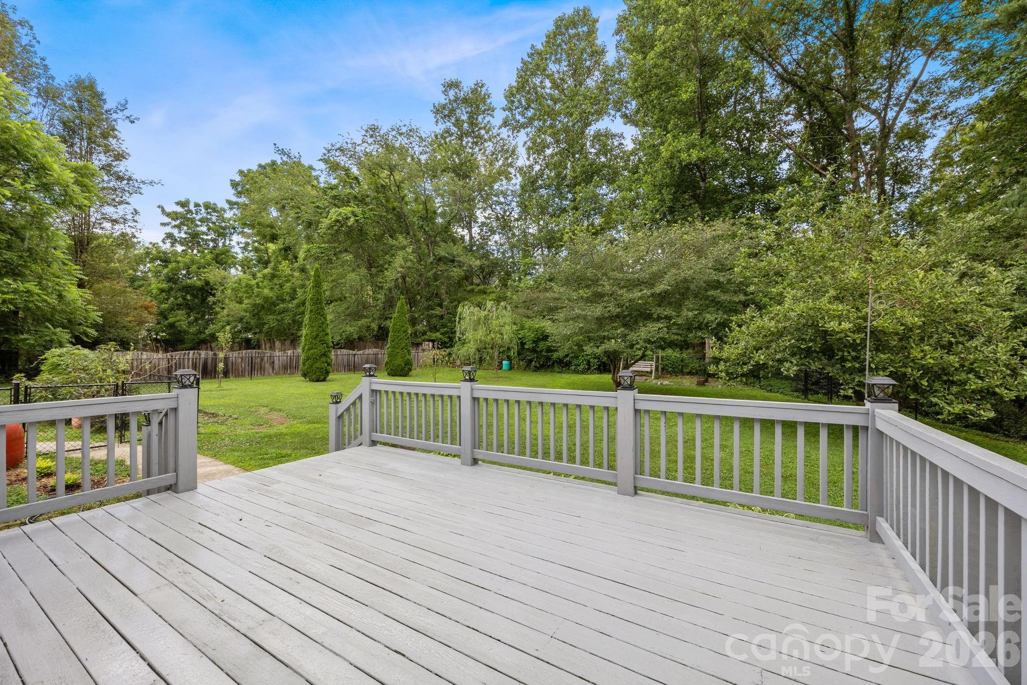 6 Springfield Way Arden, NC 28704 - Photo 36 of 47 a view of balcony with deck and trees