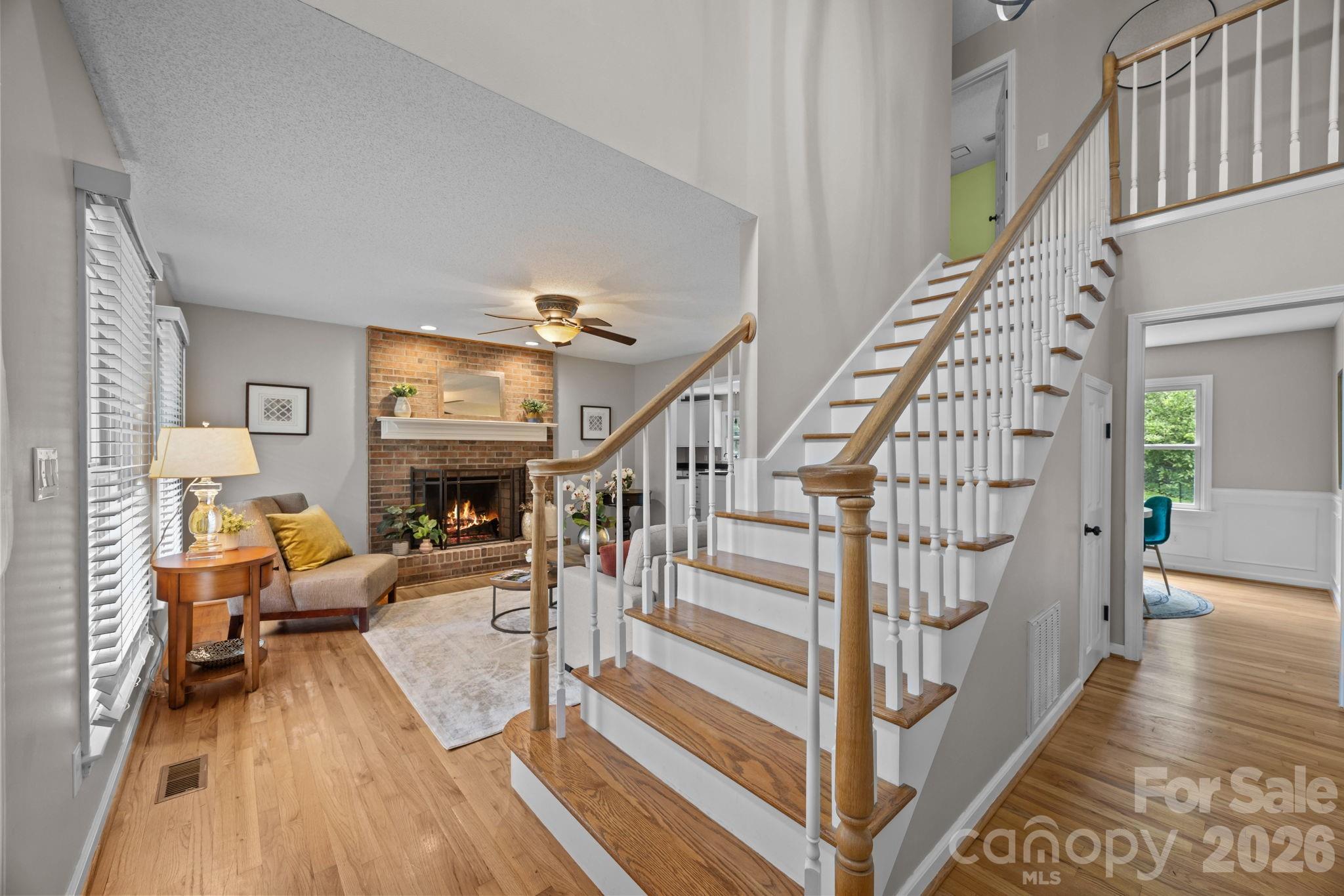 6 Springfield Way Arden, NC 28704 - Photo 4 of 47 a view of entryway and hall with wooden floor
