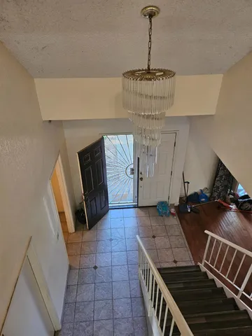 a view of an entryway and fire place