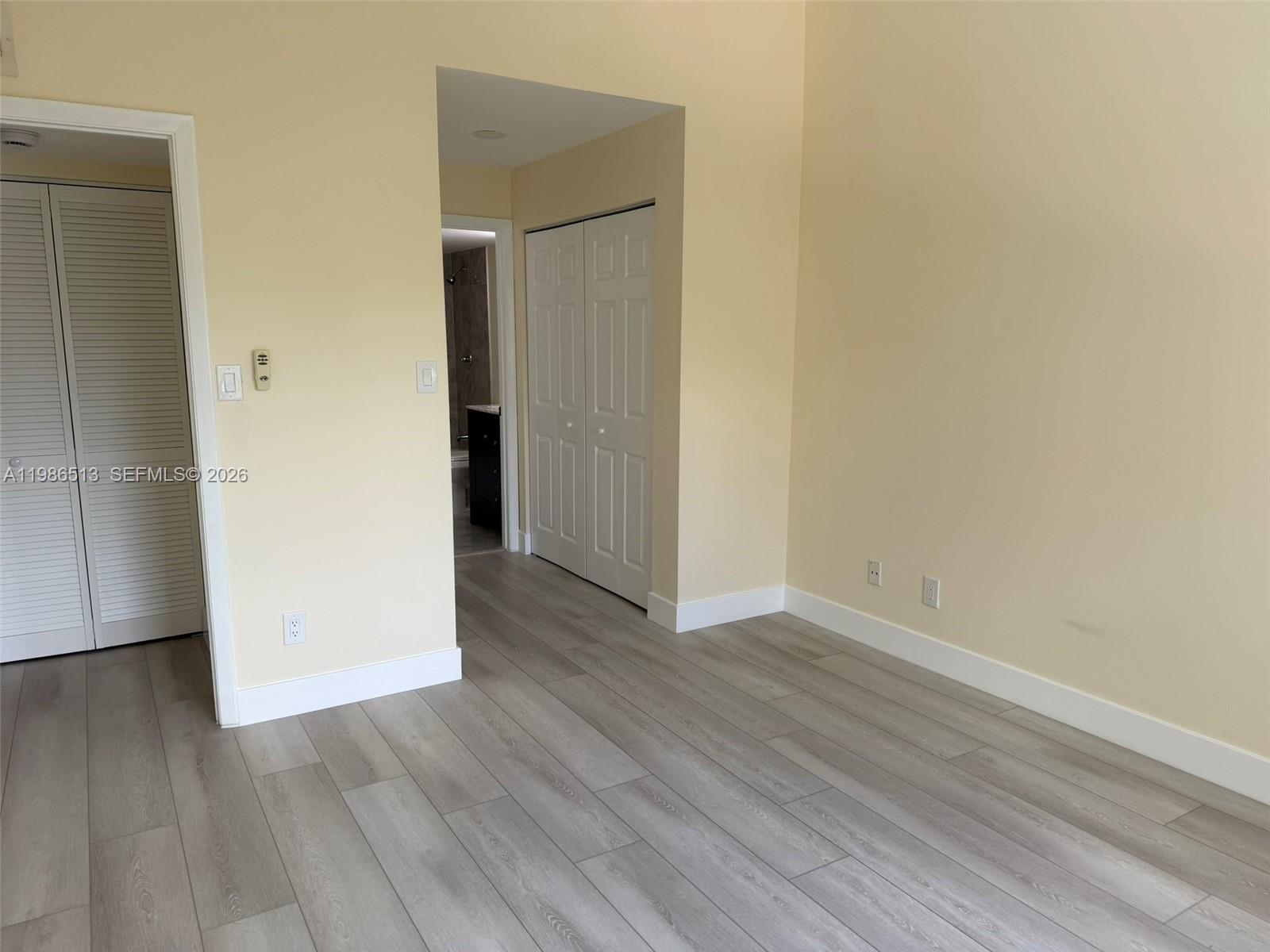 560 South Park Road, Unit 367 Hollywood, FL 33021 - Photo 17 of 28 a view of a small space with wooden floor and a window
