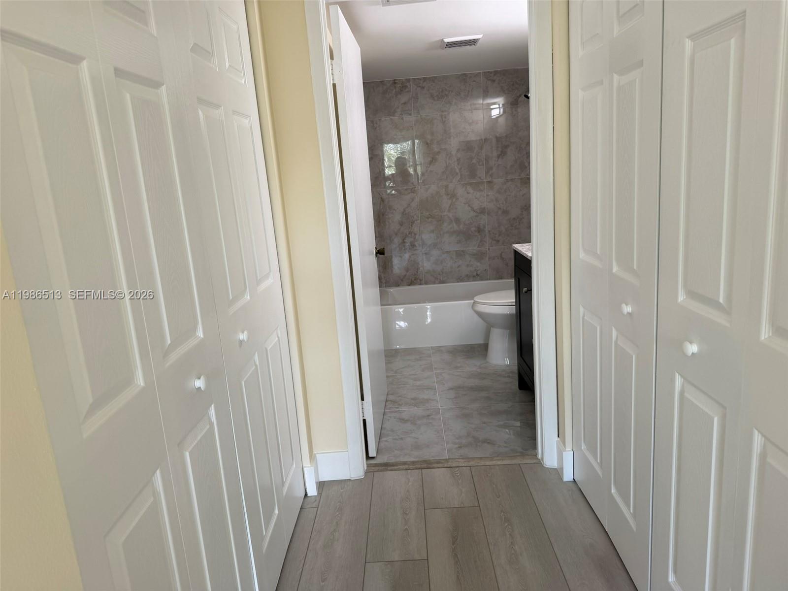 560 South Park Road, Unit 367 Hollywood, FL 33021 - Photo 19 of 28 a bathroom with a glass door shower