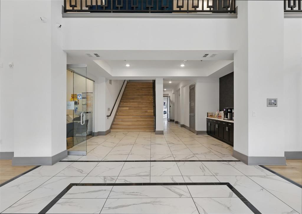 2700 Old Denton Road, Unit 1044 Carrollton, TX 75007 - Photo 27 of 39 a view of a kitchen with an empty space and a sink