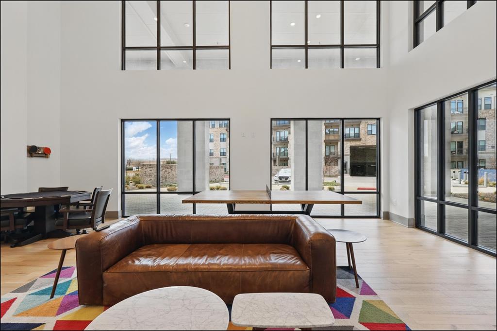 2700 Old Denton Road, Unit 1044 Carrollton, TX 75007 - Photo 29 of 39 a living room with furniture and large window