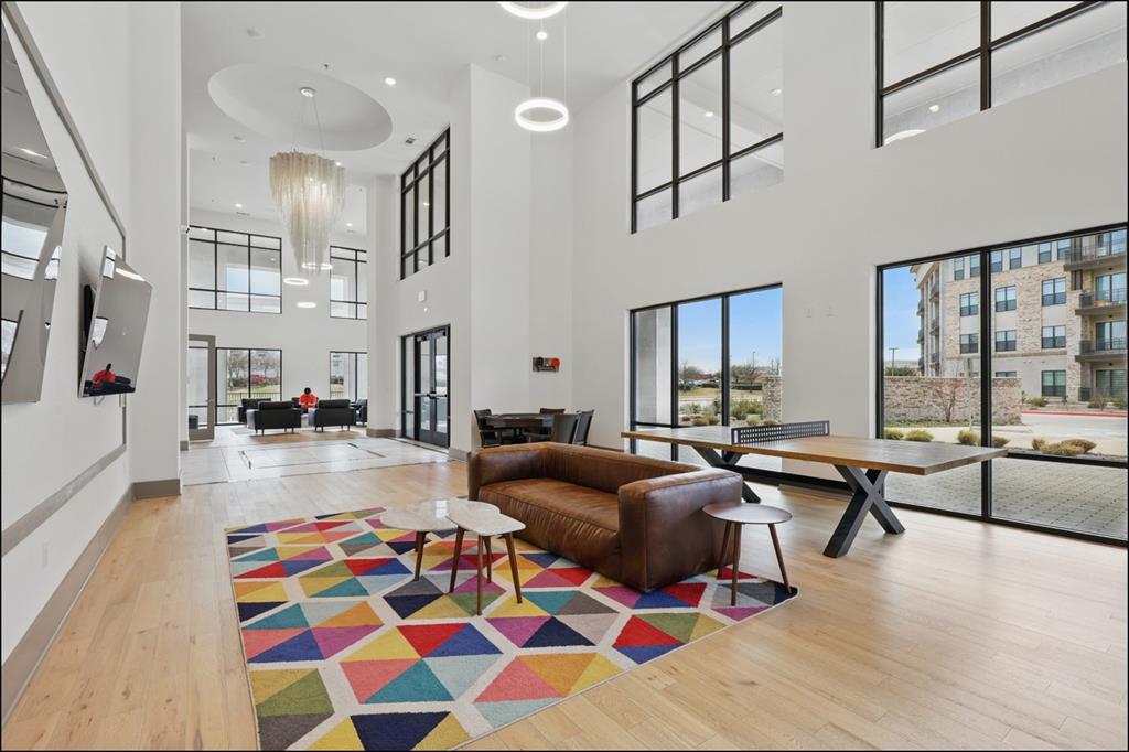2700 Old Denton Road, Unit 1044 Carrollton, TX 75007 - Photo 30 of 39 a living room with furniture and a table