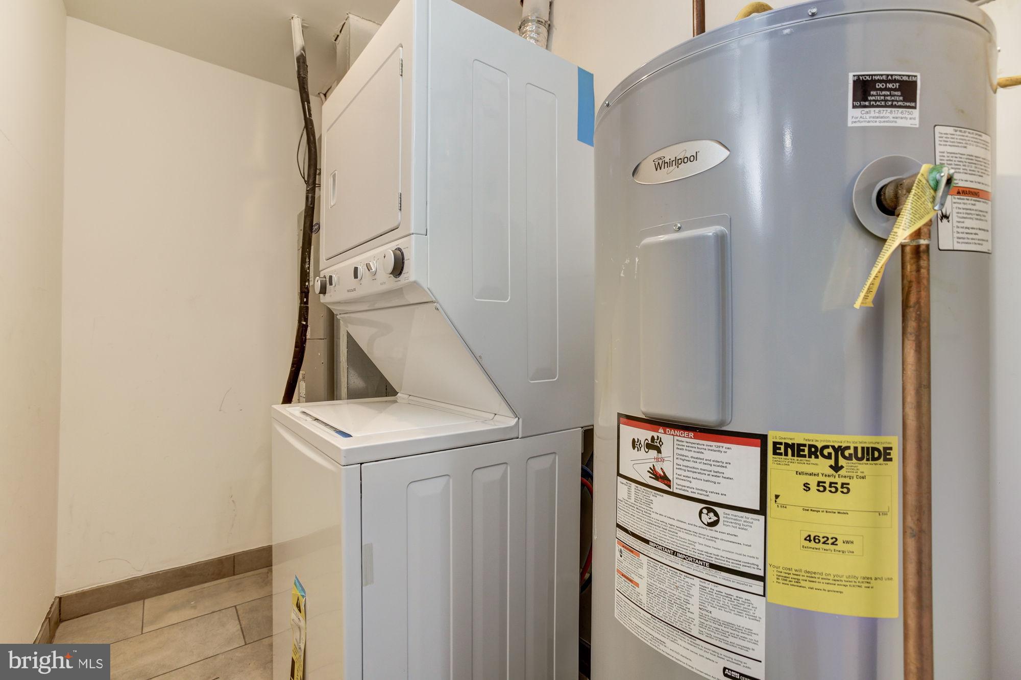 3315 Eastern Avenue, Unit 203 Baltimore, MD 21224 - Photo 7 of 13 a utility room with dryer and washer