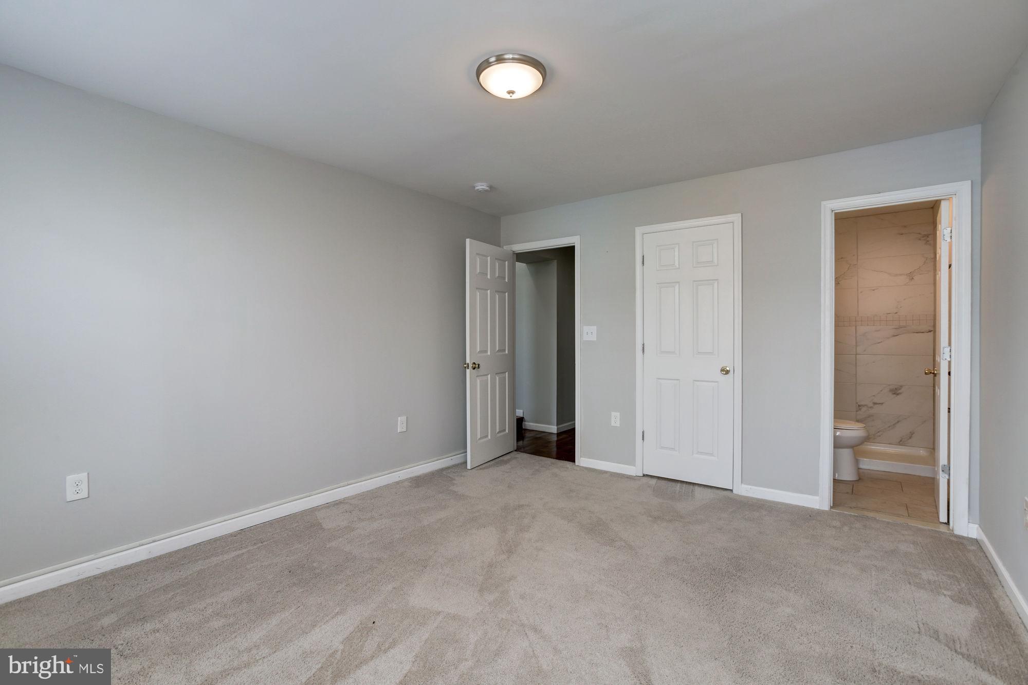 3315 Eastern Avenue, Unit 203 Baltimore, MD 21224 - Photo 9 of 13 a view of an empty room and a window