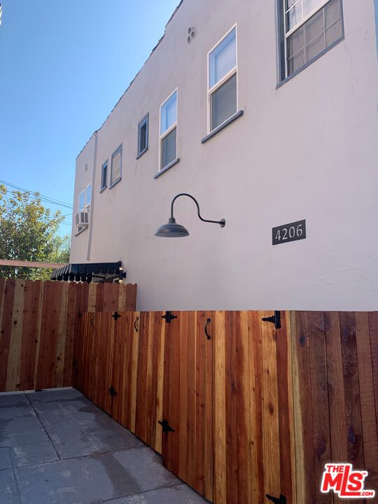4206 West 29th Street Los Angeles, CA 90016 - Photo 13 of 14 a view of a wooden fence