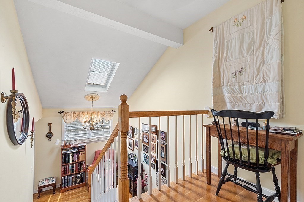 109 C Ridgefield Circle, Unit C Clinton, MA 01510 - Photo 20 of 39 a view of a hallway with seating area