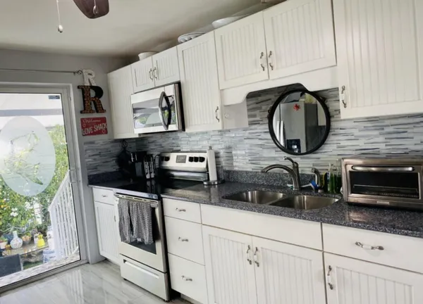 a bathroom with a toilet and shower