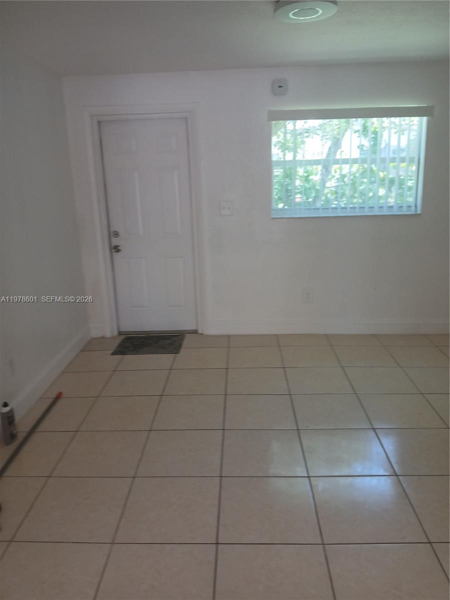 6471 Southwest 27th Street Miramar, FL 33023 - Photo 8 of 24 Family Room and door to back yard