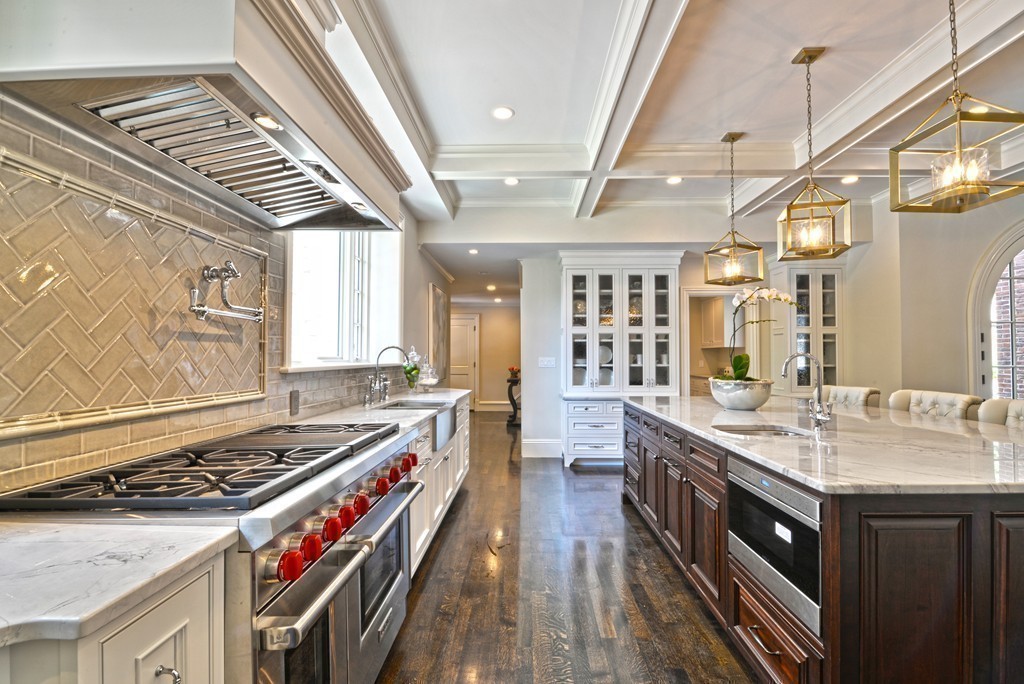 201 Hyslop Road Brookline, MA 02445 - Photo 14 of 30 a kitchen with a stove and a sink