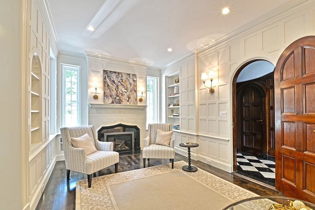 201 Hyslop Road Brookline, MA 02445 - Photo 18 of 30 a living room with furniture a lamp and a fireplace