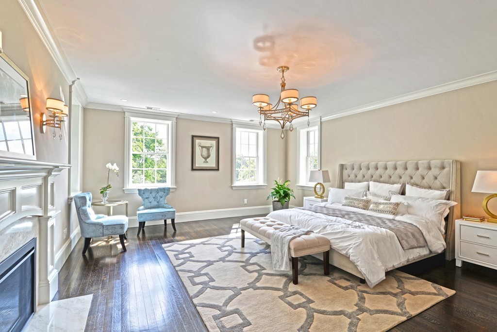 201 Hyslop Road Brookline, MA 02445 - Photo 24 of 30 a spacious bedroom with a bed and wooden floor