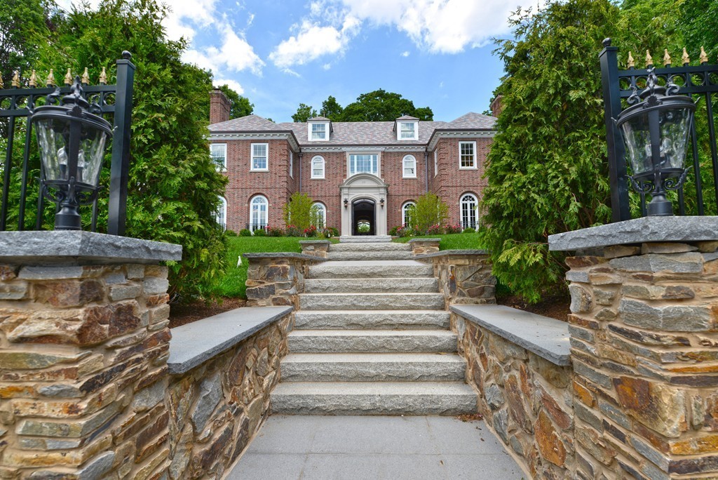 201 Hyslop Road Brookline, MA 02445 - Photo 4 of 30 a front view of a house with a garden
