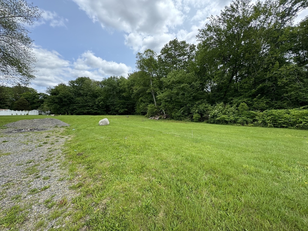 454 Fall River Avenue Seekonk, MA 02771 - Photo 6 of 11 a view of a field with trees in the background