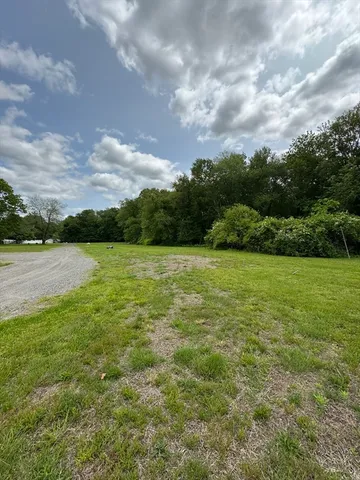 a view of a lake view with a big yard