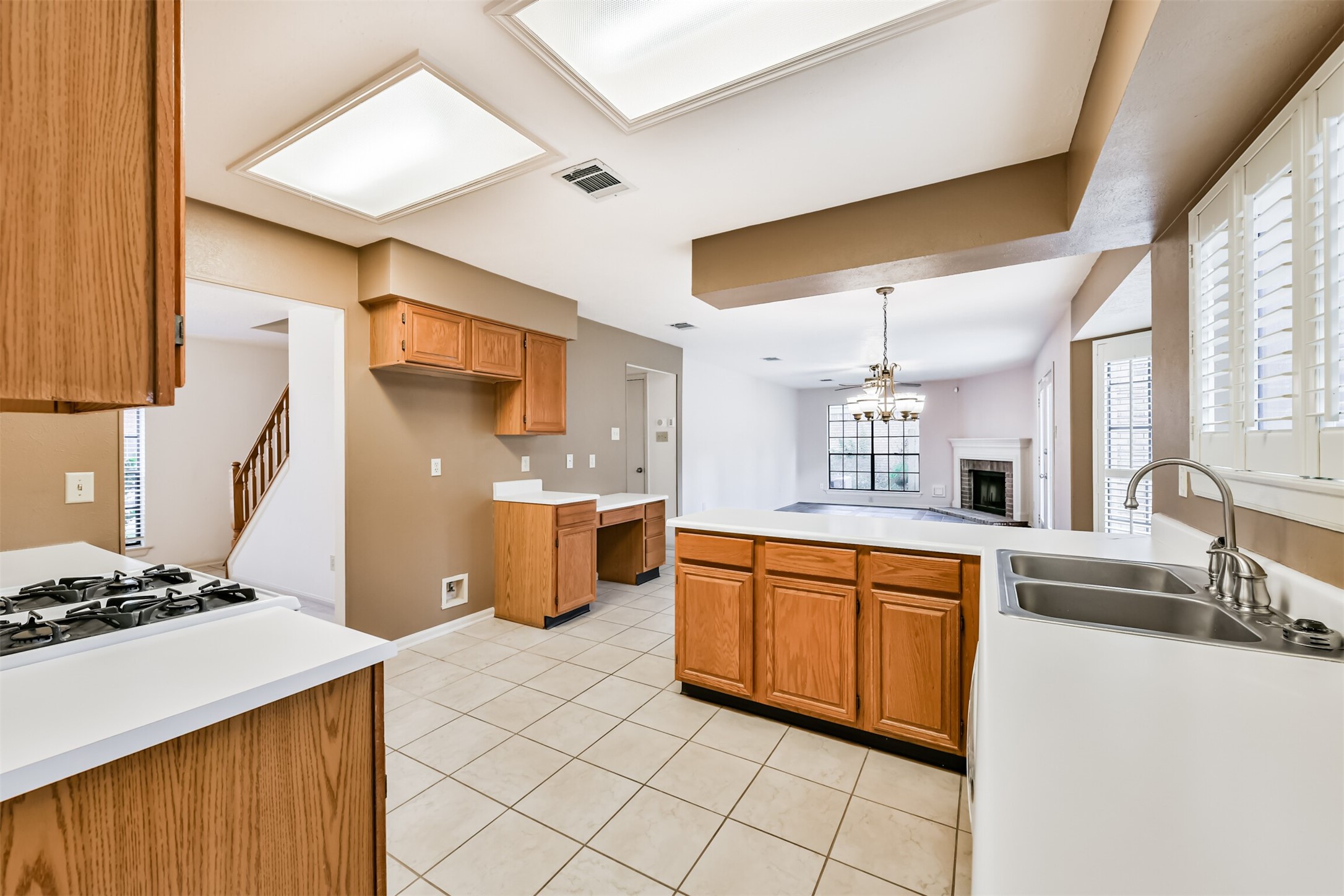 14506 Harvest Ridge Road Houston, TX 77062 - Photo 17 of 39 a kitchen with stainless steel appliances granite countertop a sink and a refrigerator