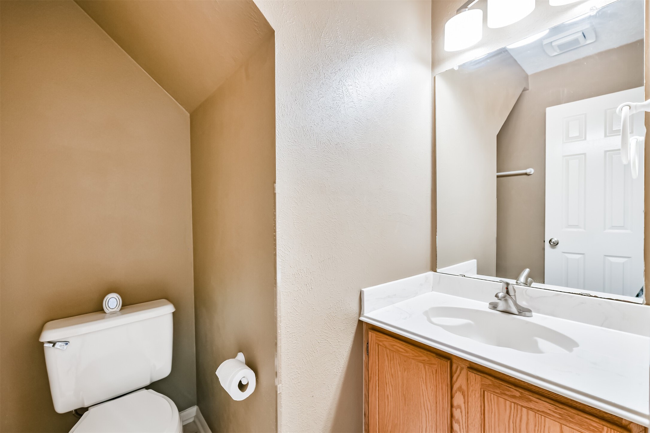 14506 Harvest Ridge Road Houston, TX 77062 - Photo 21 of 39 a bathroom with a granite countertop toilet sink and mirror
