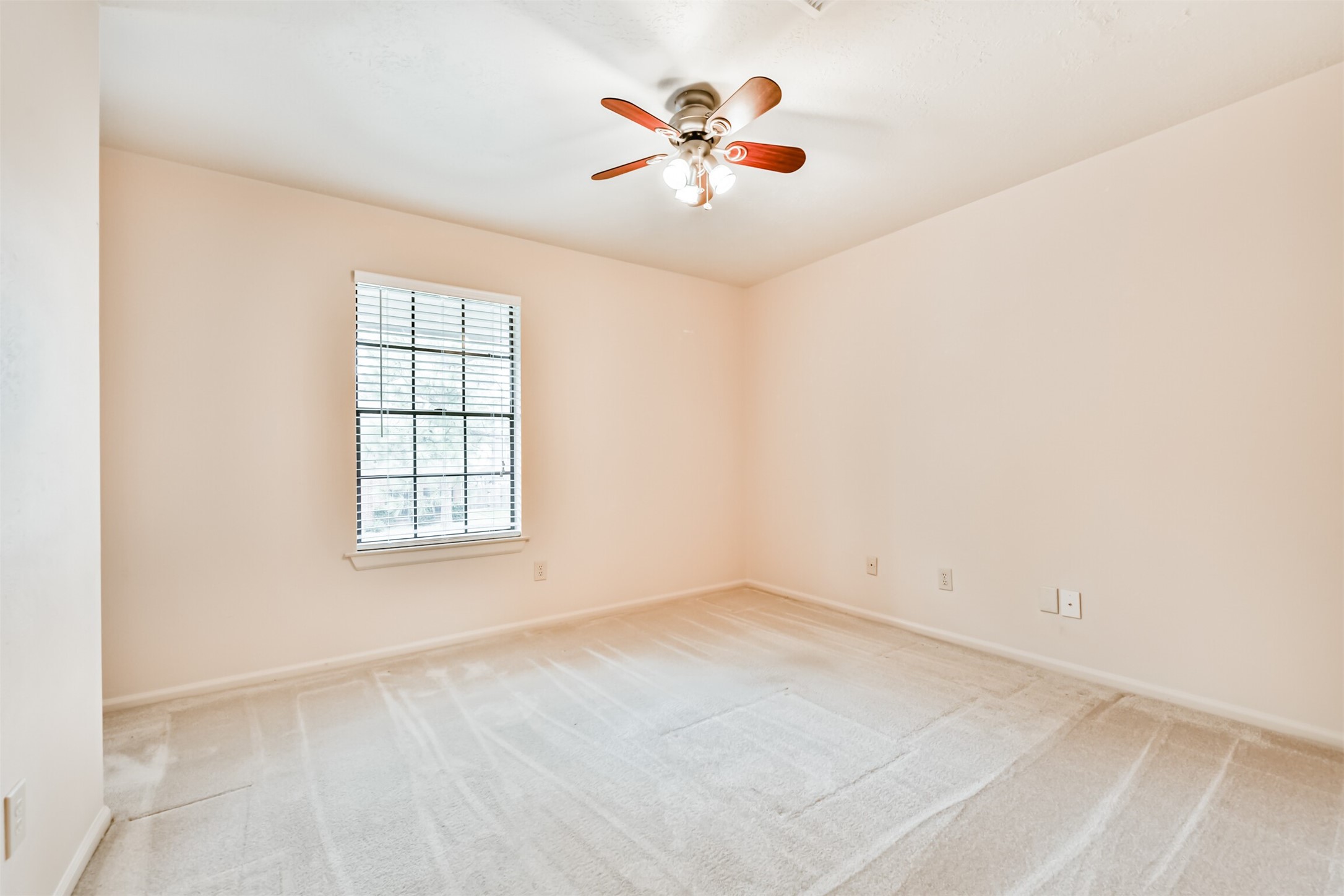 14506 Harvest Ridge Road Houston, TX 77062 - Photo 28 of 39 an empty room with a window