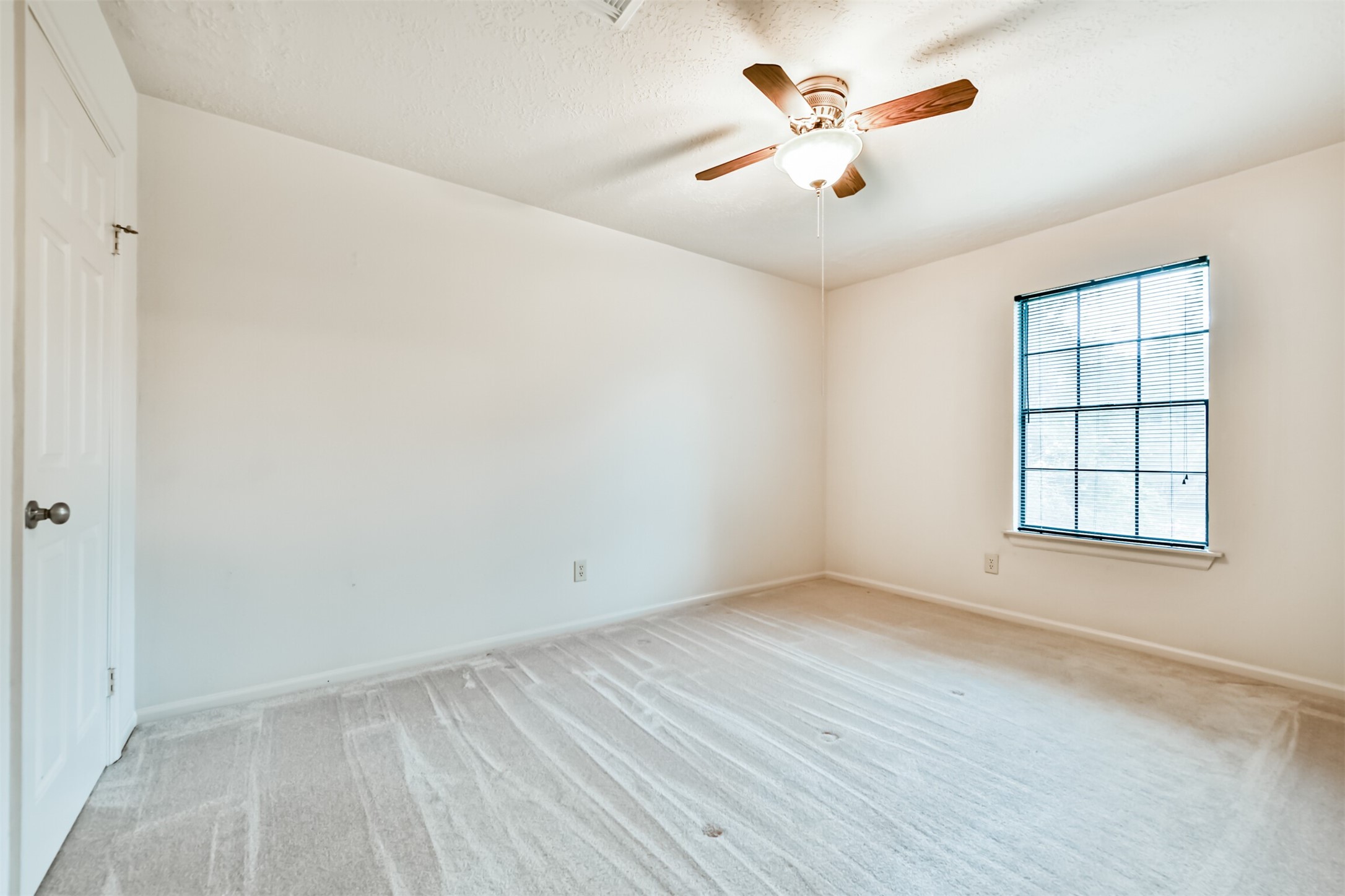 14506 Harvest Ridge Road Houston, TX 77062 - Photo 34 of 39 wooden floor in an empty room with a window