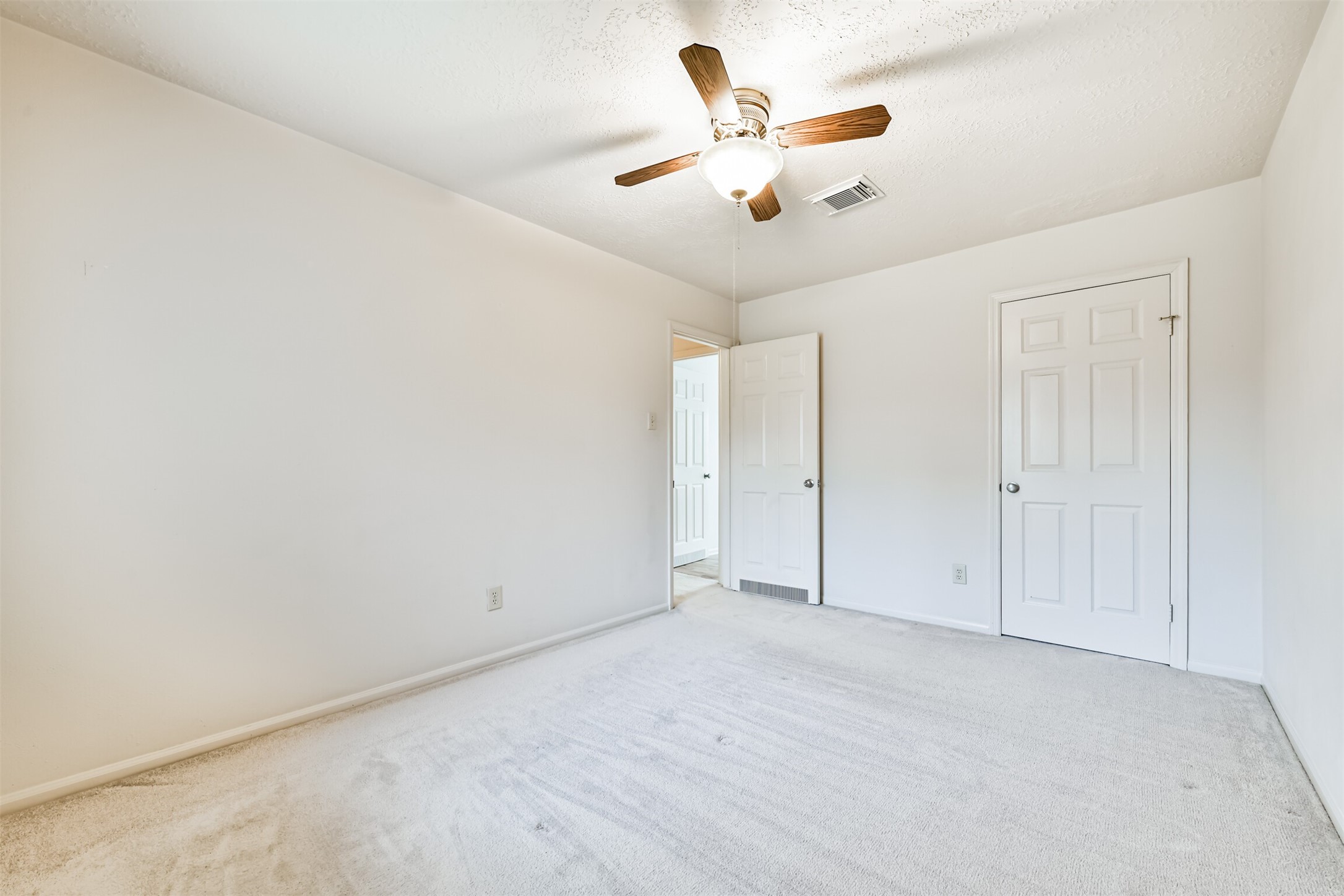 14506 Harvest Ridge Road Houston, TX 77062 - Photo 35 of 39 an empty room with fan