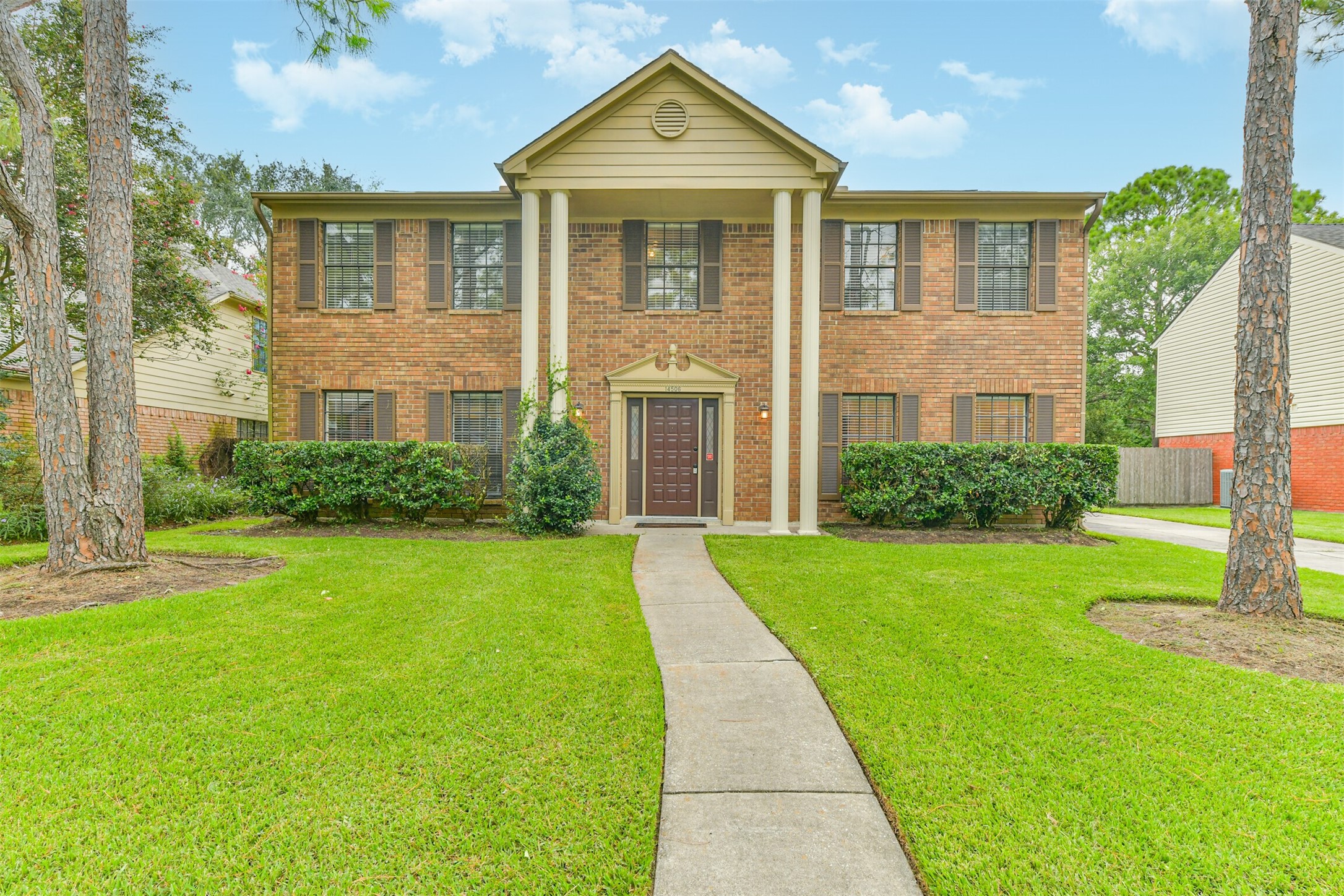 14506 Harvest Ridge Road Houston, TX 77062 - Photo 39 of 39 a front view of a house with garden