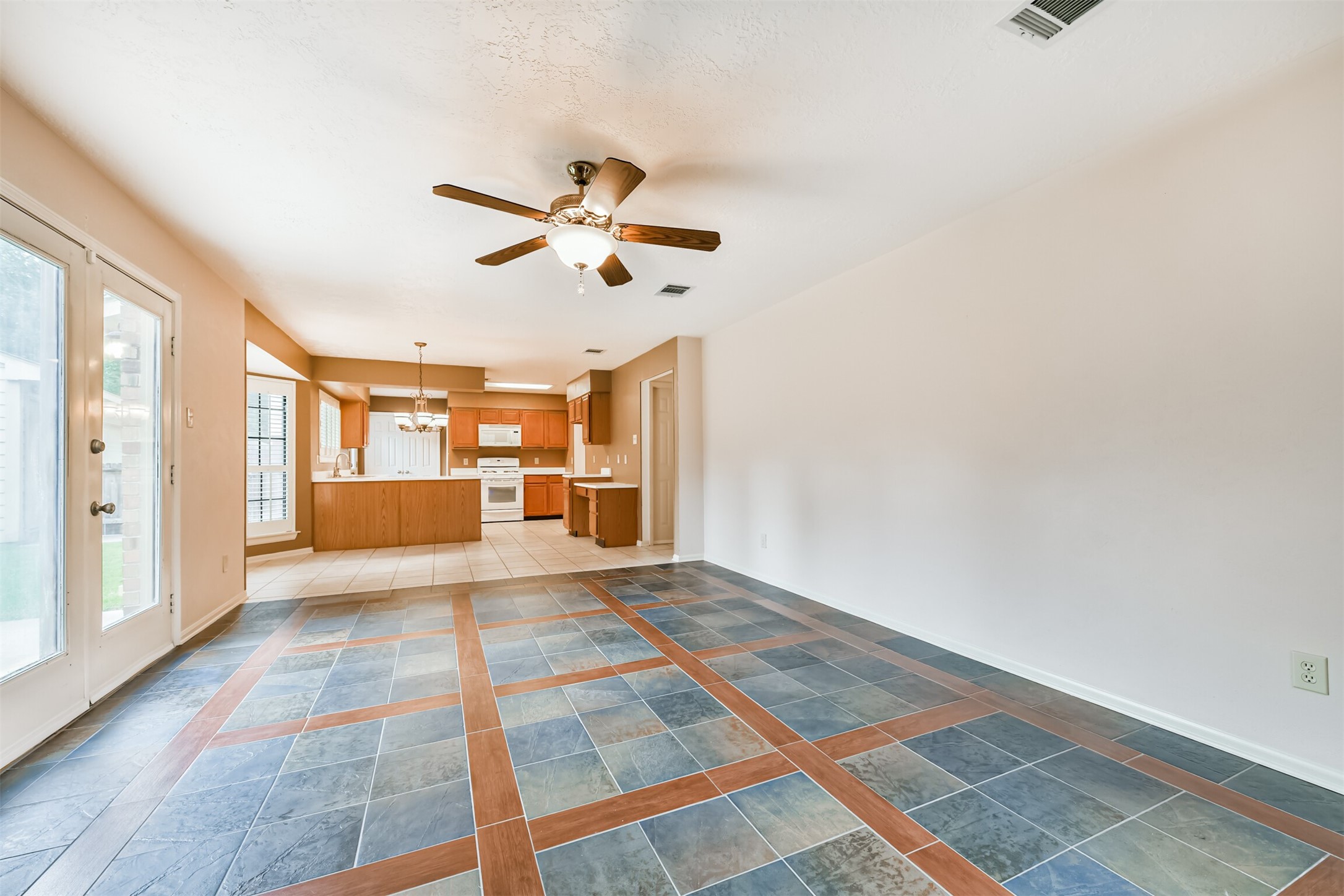 14506 Harvest Ridge Road Houston, TX 77062 - Photo 5 of 39 a view of an empty room with a window