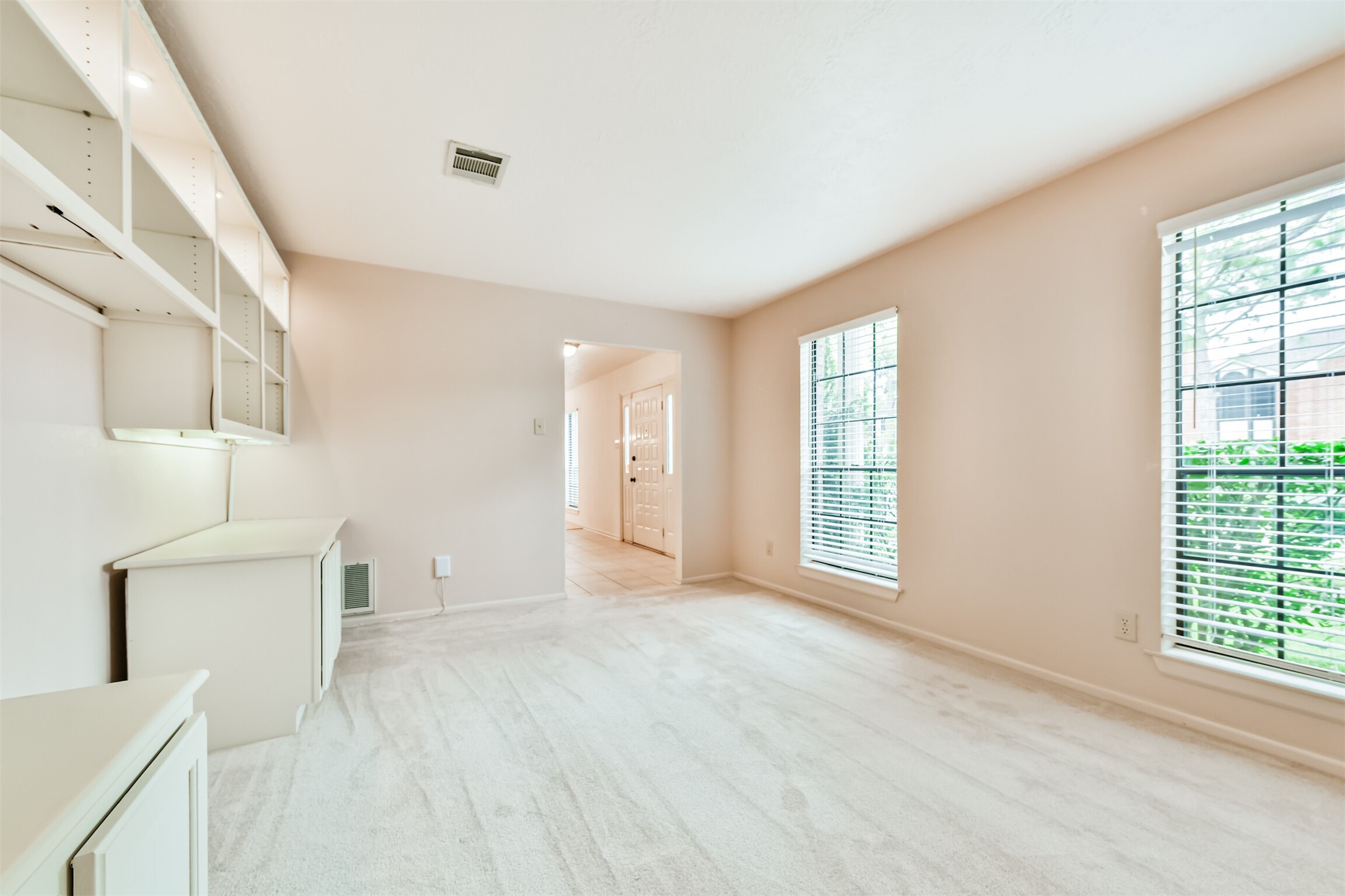 14506 Harvest Ridge Road Houston, TX 77062 - Photo 9 of 39 a view of an empty room with a window