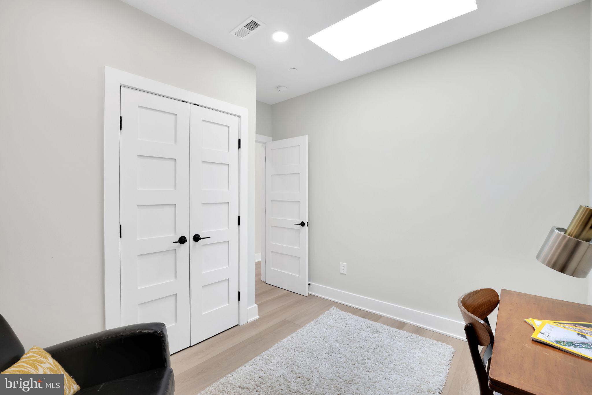 4019 9th Street Northeast, Unit 2 Washington, DC 20017 - Photo 22 of 27 a view of a livingroom with wooden floor