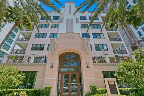 a view of a chairs and table in the balcony