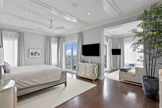 a view of a hallway with a washer and dryer