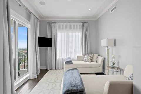 a room with furniture and wooden floor