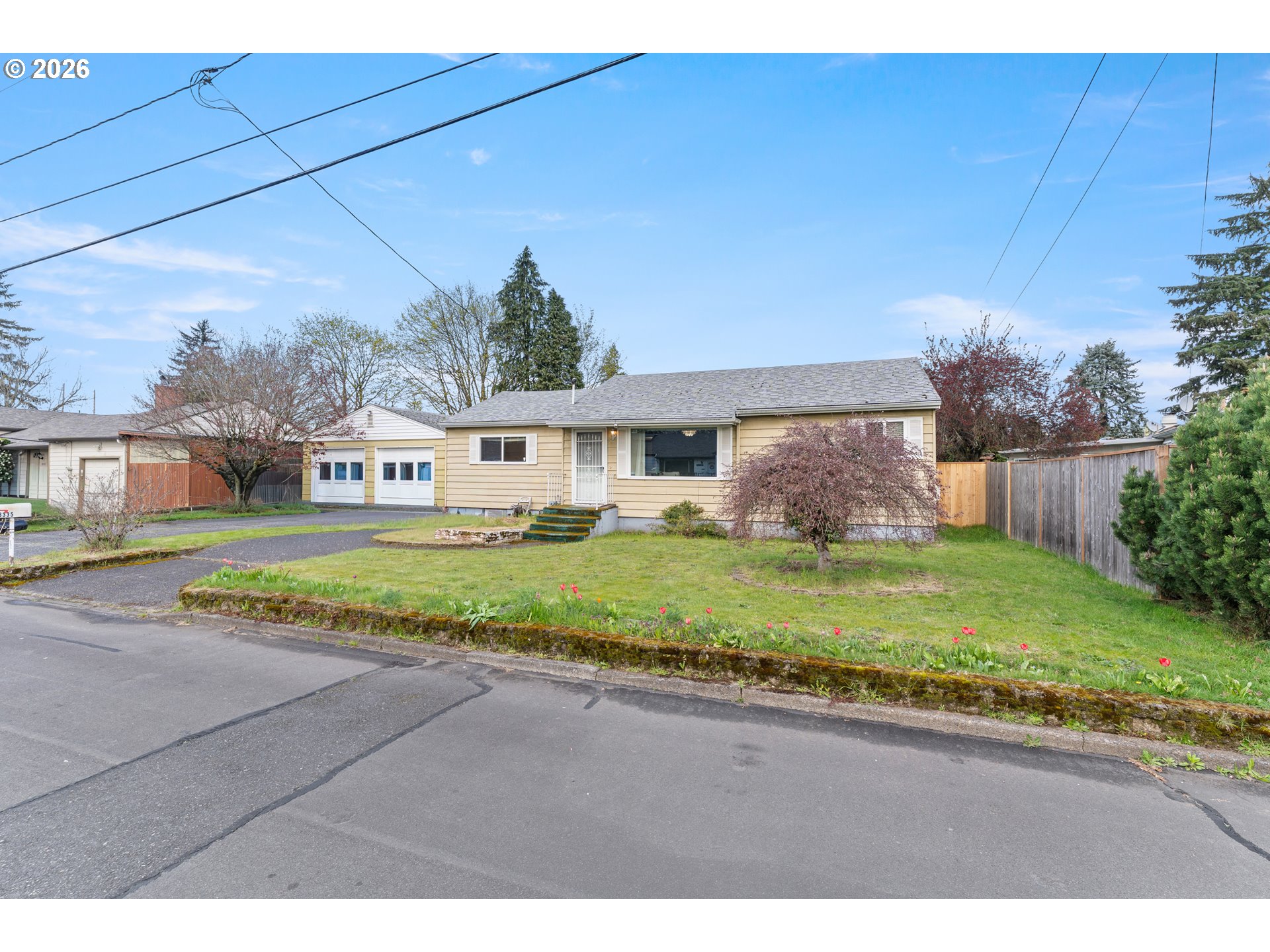18335 Northeast Flanders Street Portland, OR 97230 - Photo 1 of 20 a front view of a house with a yard