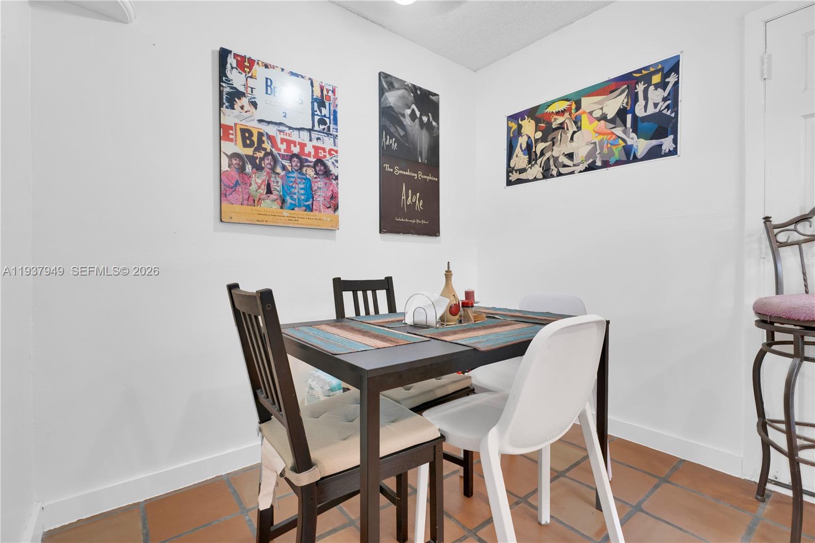 4739 Southwest 5th Street Miami, FL 33134 - Photo 29 of 40 a view of a dining room with furniture